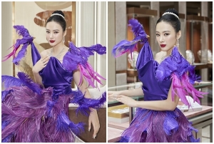 Angela Phương Trinh nổi bật trong chiếc váy màu tím đính kết lông vũ