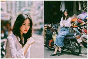 Tiểu Vy phối chiếc áo sơ mi cùng chiếc váy jean mang hơi hướng cổ điển
